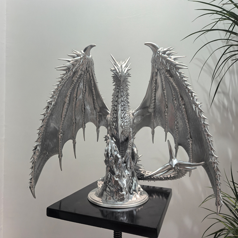 Menneskeskulptur i glassfiber i gargoyle-stil